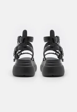 KOI FOOTWEAR Raining Vengeance Charm Platform - Platform Sandals -Fashion Store 36456e37e2934e2ead7aeddaa63c366b