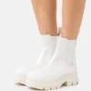 Calvin Klein Jeans Chunky Combat Chelsea Boot - Platform Ankle Boots - White -Fashion Store 8e2fbb1e79404c3eab4415b6fa90fadd
