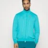 Nike Performance Heritage - Training Jacket - Teal -Fashion Store 98149e1d031246e0bfd9ed0f145741c9