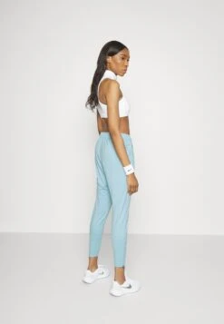 Nike Performance Essential Novelty Pant - Tracksuit Bottoms - Ocean Bliss/Silver 9 Nike Performance Essential Novelty Pant - Tracksuit Bottoms - Ocean Bliss/Silver -Fashion Store ffa0419c71c6404dbf20e33c46703c6e